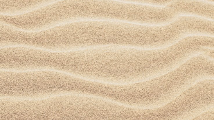 VISUELL Kommunikationsdesign: Corporate Design und Internetseite für die Praxis ORTHOFIT Stuttgart VISUELL Kommunikationsdesign: Corporate Design: Detailaufnahme eines Sandstrandes, leichtes Wellenmuster mit Licht- und Schattenspiel.