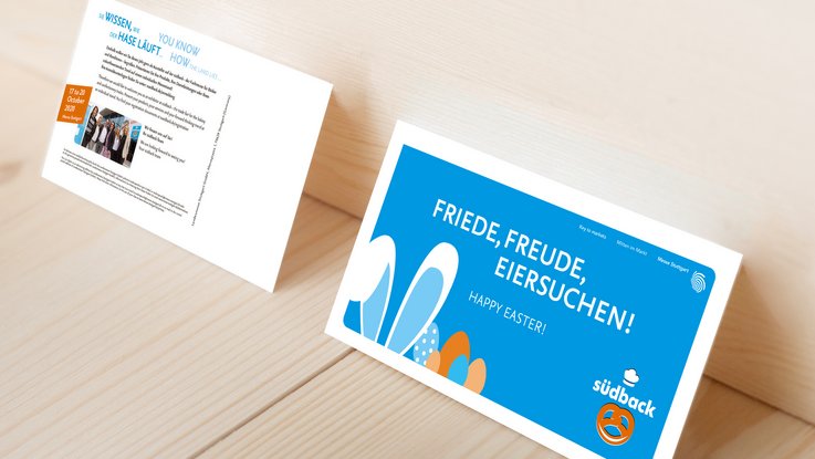 VISUELL Kommunikationsdesign: Redesign der südback – Fachmesse für Bäckerei und Konditorei an der Messe Stuttgart VISUELL Kommunikationsdesign: Redesign der südback: Vorder- und Rückseite des Ostergrußes - Aufschrift: Friede, Freude, Eiersuchen! Wir wissen, wie der Hase läuft.